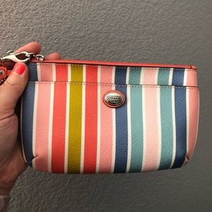 Coach striped clutch striped